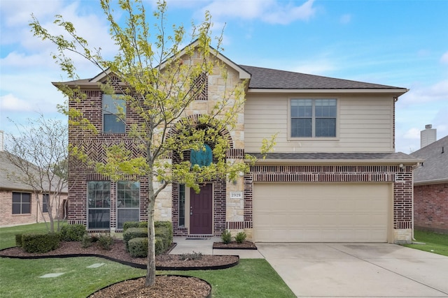 view of front of house featuring a front lawn and a garage