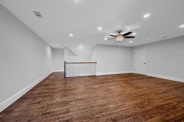 unfurnished room featuring baseboards, visible vents, dark wood-style floors, ceiling fan, and recessed lighting