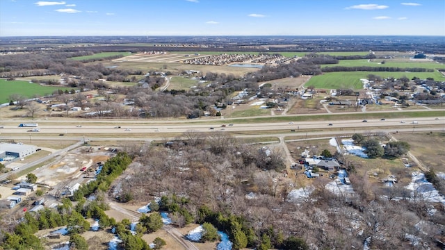 birds eye view of property featuring a rural view