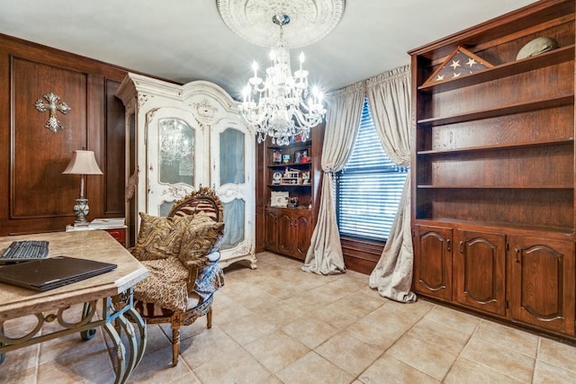 dining room featuring light tile patterned floors, a notable chandelier, and wooden walls