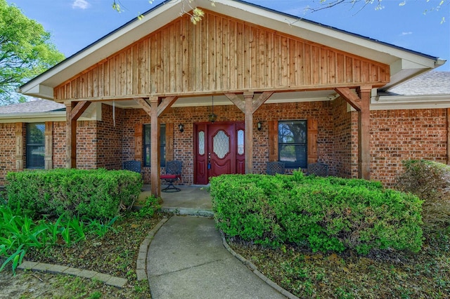 entrance to property with a porch