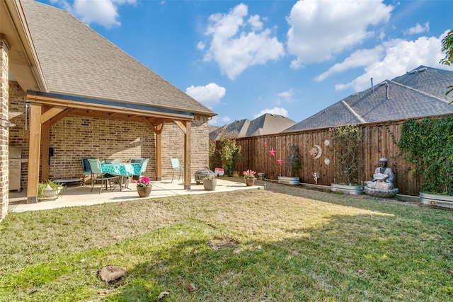 view of yard with a patio area