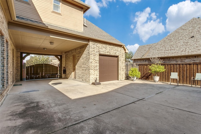 view of property exterior with a garage