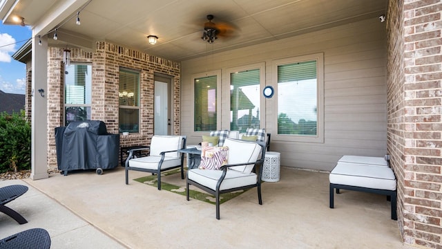 view of patio featuring grilling area and ceiling fan