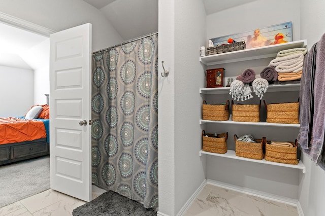 bathroom featuring curtained shower