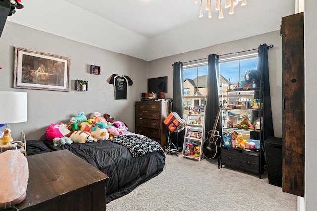 bedroom featuring light carpet