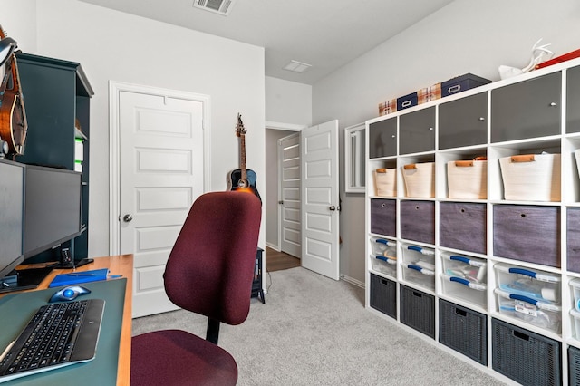 home office featuring light colored carpet