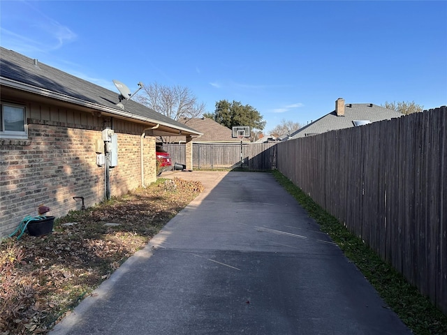 view of side of property with a patio