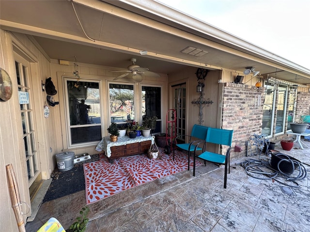 view of patio with ceiling fan