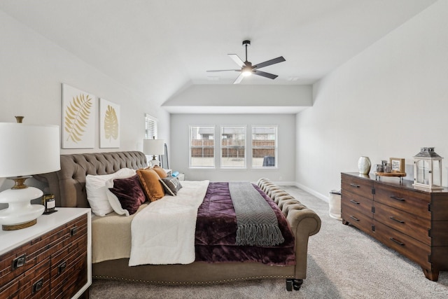 bedroom featuring light carpet, ceiling fan, baseboards, and vaulted ceiling