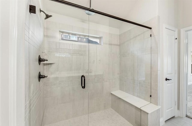 bathroom featuring tile patterned floors and walk in shower