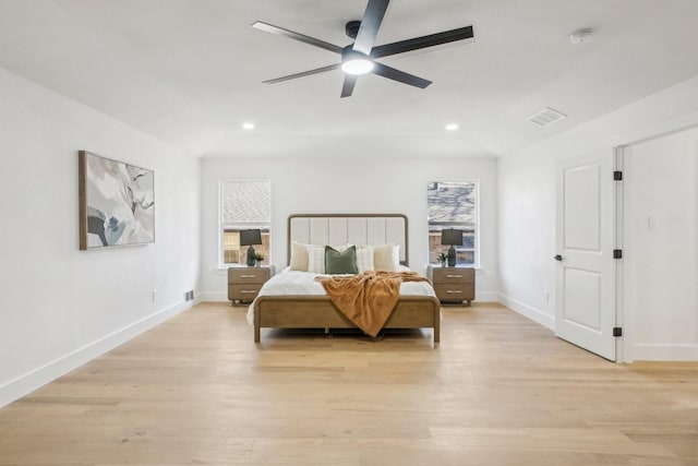 bedroom with light wood-type flooring and ceiling fan