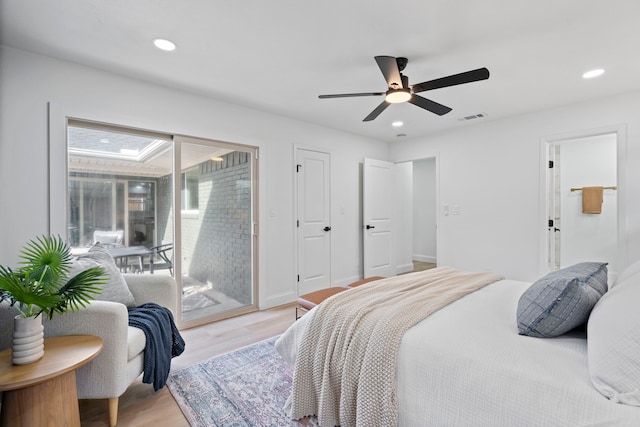 bedroom featuring access to outside, ceiling fan, and light wood-type flooring