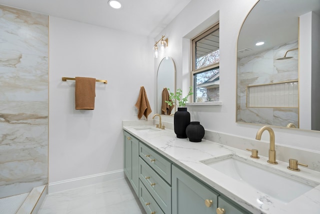 bathroom featuring vanity and a shower