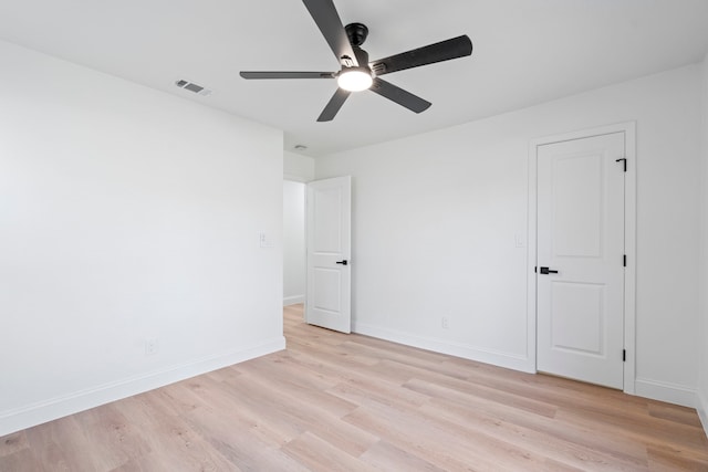 unfurnished room featuring ceiling fan and light hardwood / wood-style flooring