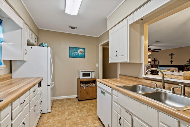 kitchen with white cabinetry, ceiling fan, white appliances, ornamental molding, and sink