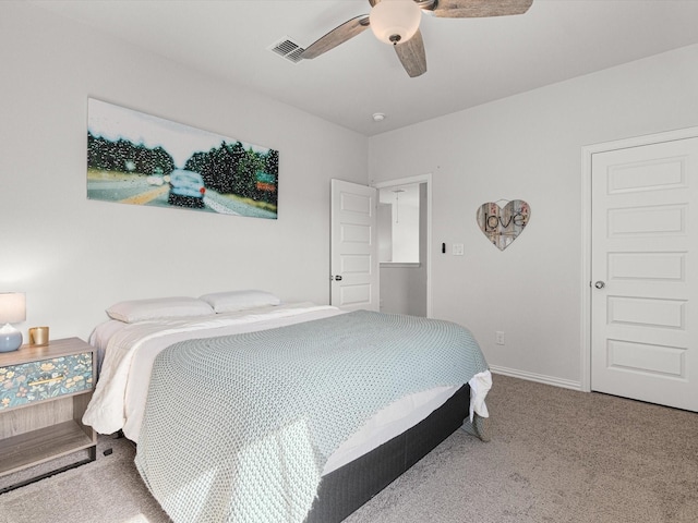 bedroom with ceiling fan and carpet flooring