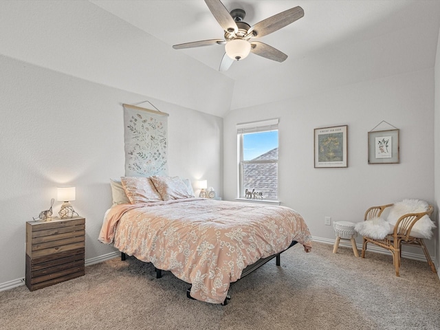 bedroom featuring ceiling fan, carpet flooring, and vaulted ceiling