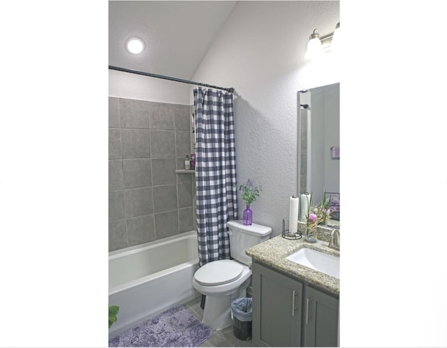 full bathroom featuring toilet, vanity, and shower / bath combo with shower curtain