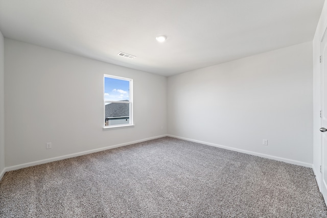 empty room with carpet floors