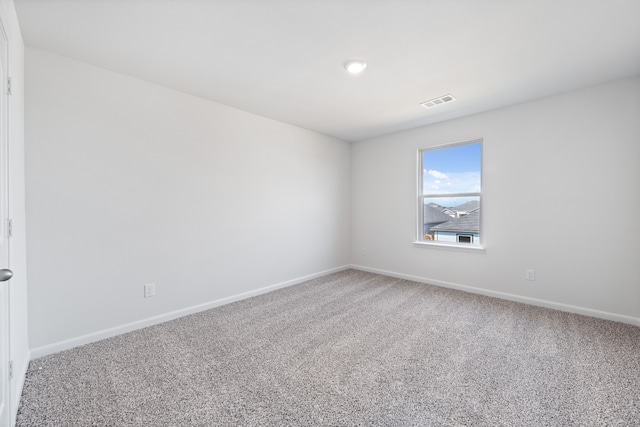 unfurnished room featuring carpet floors