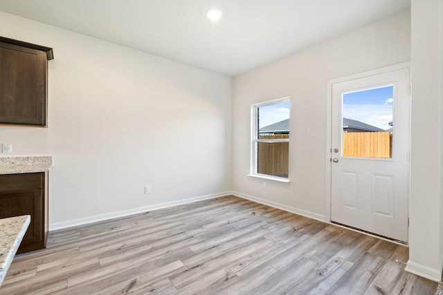 interior space with light hardwood / wood-style flooring