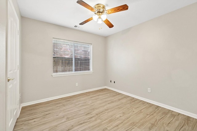 unfurnished room featuring ceiling fan and light hardwood / wood-style flooring