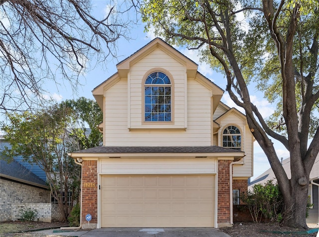 front facade with a garage