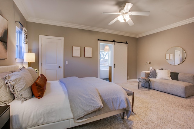 bedroom featuring a barn door, ceiling fan, connected bathroom, carpet floors, and crown molding