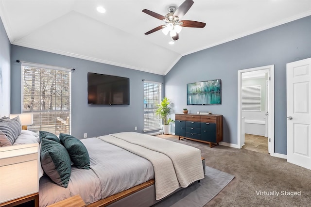 bedroom with crown molding, ceiling fan, ensuite bathroom, carpet flooring, and vaulted ceiling