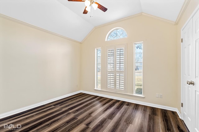 unfurnished room featuring lofted ceiling, ornamental molding, dark hardwood / wood-style floors, and ceiling fan