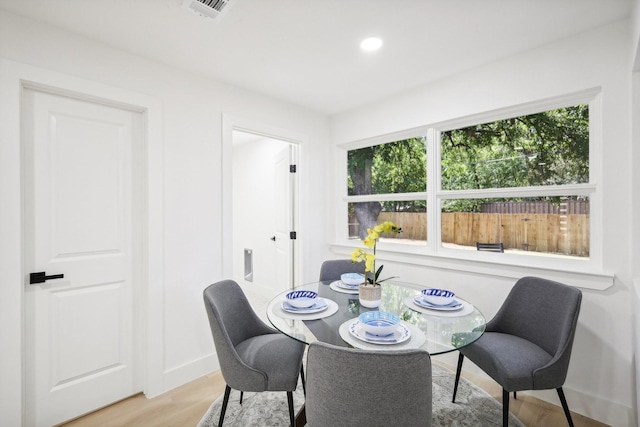 dining space featuring light hardwood / wood-style flooring