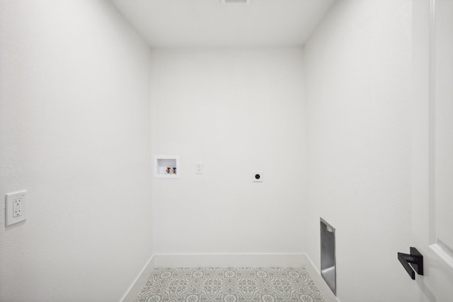 clothes washing area featuring light tile patterned floors, hookup for a washing machine, and hookup for an electric dryer