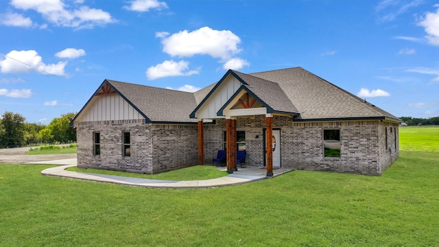 view of front of home with a front lawn