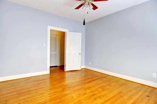 spare room with ceiling fan and light hardwood / wood-style floors