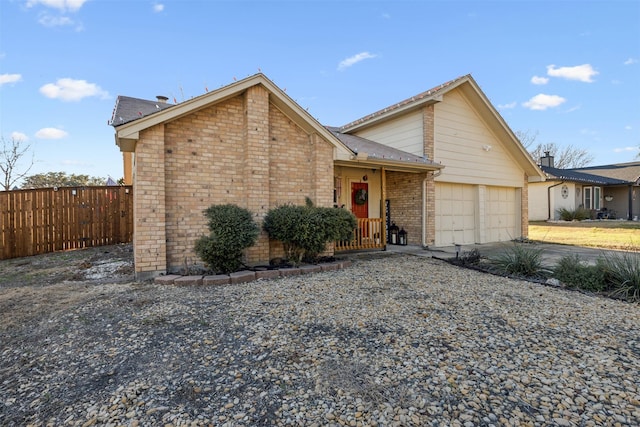 view of front of property featuring a garage