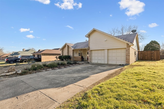 ranch-style house with a garage and a front yard