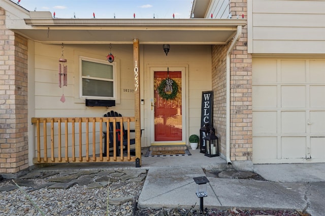 property entrance featuring a garage