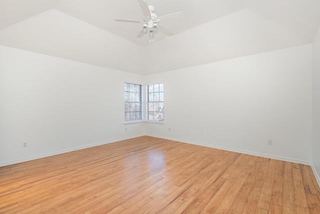 unfurnished room with ceiling fan, lofted ceiling, and light hardwood / wood-style floors