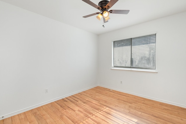 unfurnished room featuring ceiling fan and light wood-type flooring