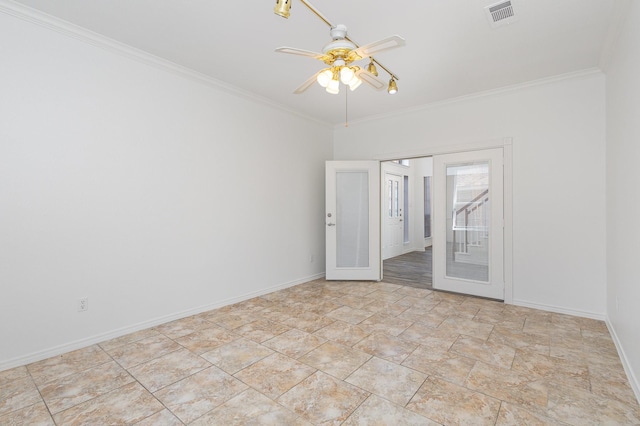 empty room with ceiling fan, crown molding, and french doors