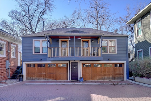 view of front of property with a garage