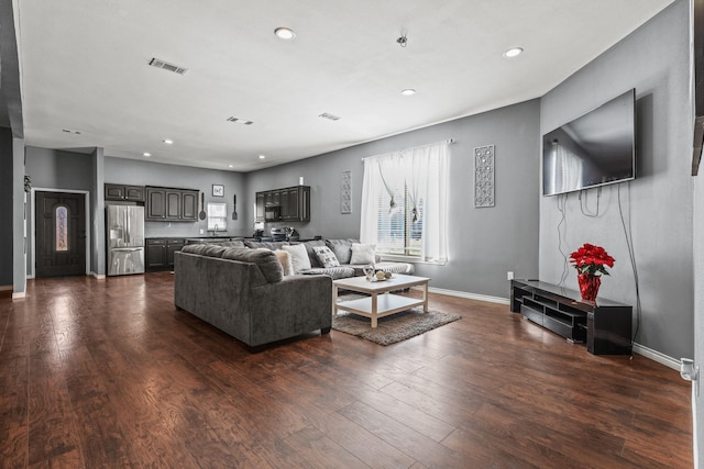 living room with dark wood-type flooring