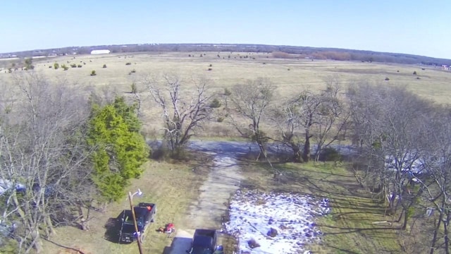 birds eye view of property featuring a rural view