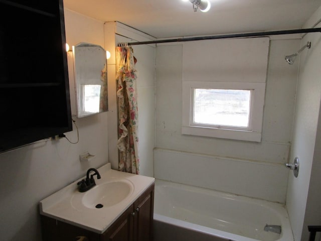 bathroom with vanity and shower / bath combo