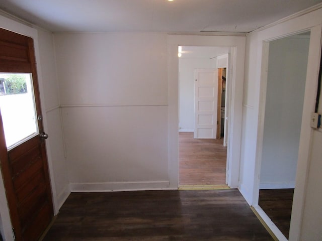 hallway featuring dark hardwood / wood-style floors