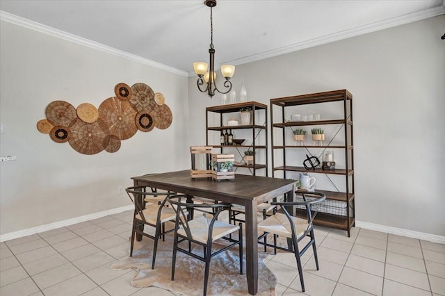 tiled dining room featuring a chandelier and ornamental molding