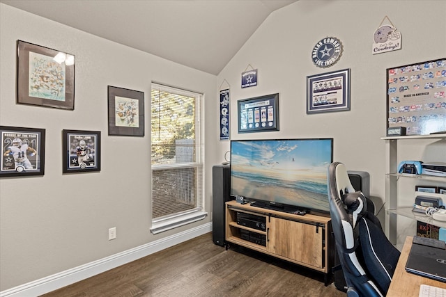 home office with dark hardwood / wood-style flooring and vaulted ceiling