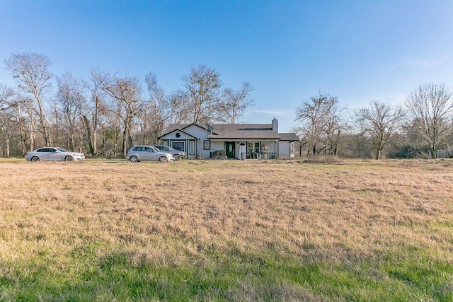 exterior space with a front yard