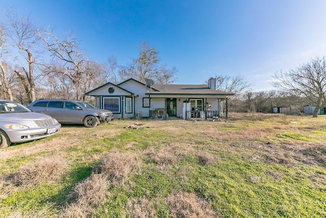 single story home featuring covered porch